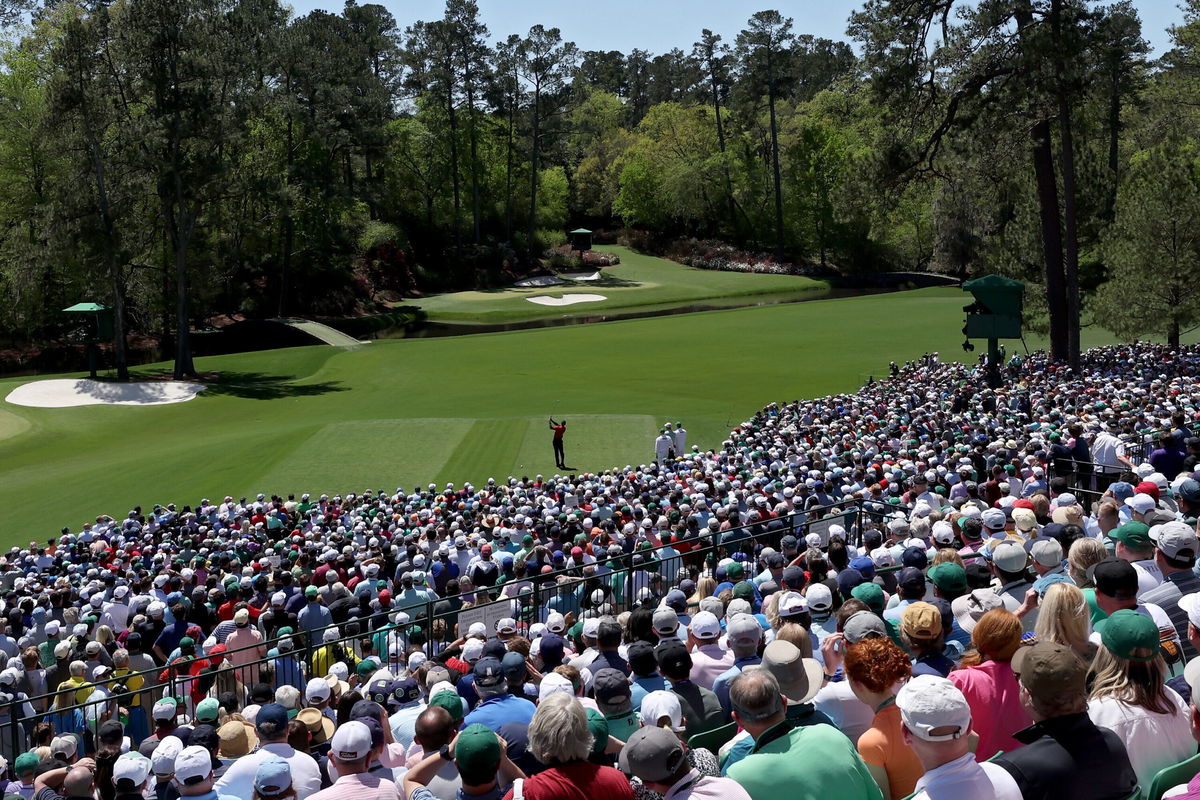 <i>Gregory Shamus/Getty Images</i><br/>Tiger Woods plays his shot from the 12th tee during the final round of the Masters.