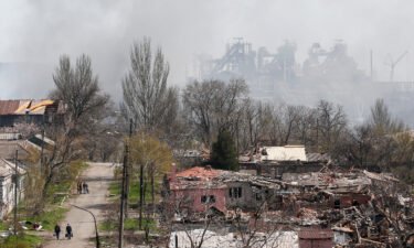 Smoke rises above the Azovstal plant as nearby buildings were flattened to the ground in Mariupol on April 18.