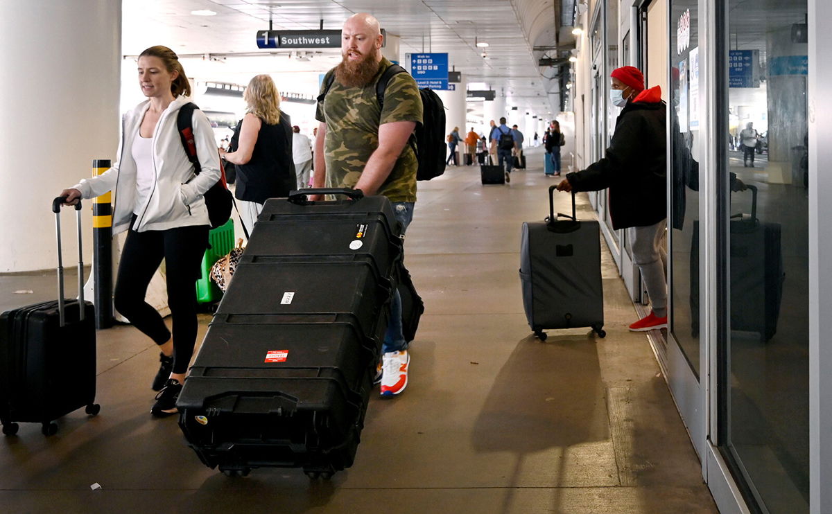 <i>Brittany Murray/MediaNews Group/Long Beach Press-Telegram/Getty Images</i><br/>Air passengers in the US are no longer required to wear a mask. Everything you need to know about the new US rules.