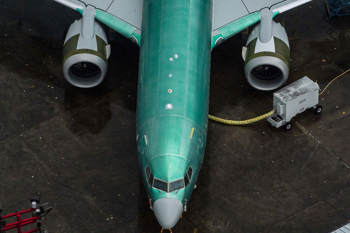 <i>David Ryder/Getty Images</i><br/>A Boeing 737 Max airplane sits parked at the company's production facility on November 18