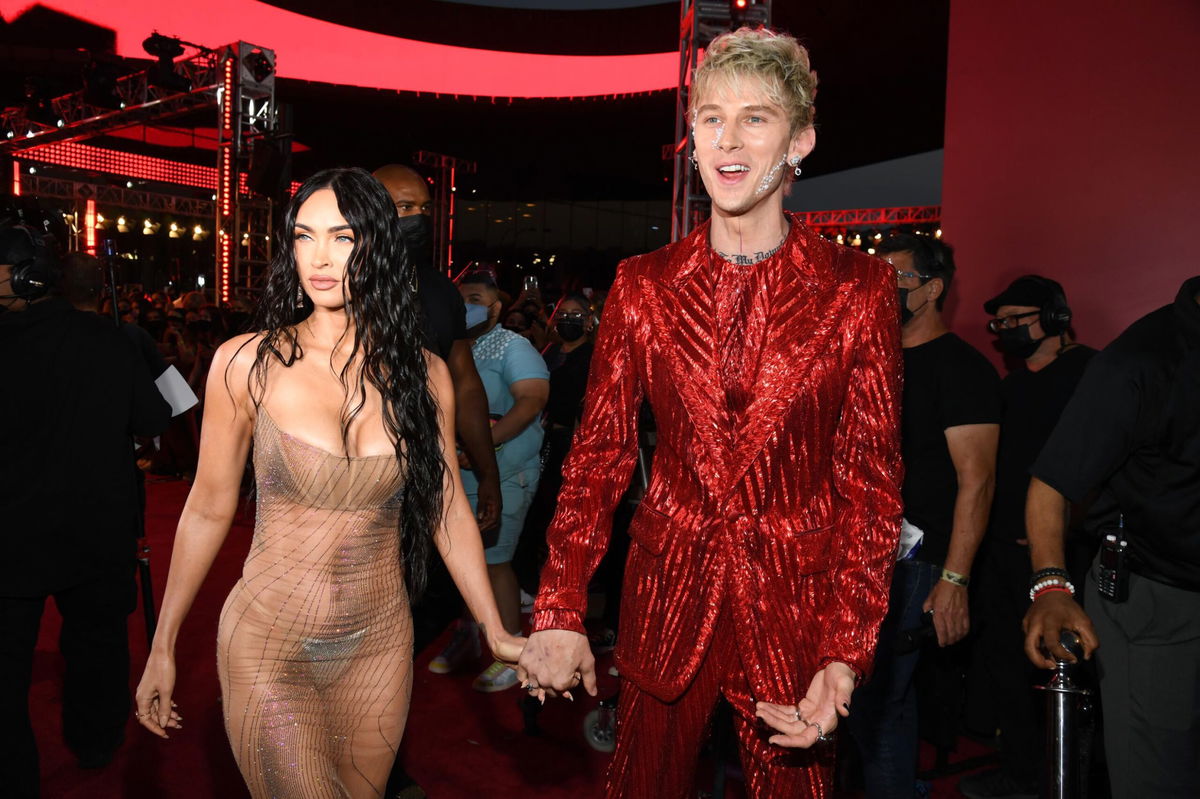 <i>Kevin Mazur/MTV VMAs 2021/Getty Images for MTV/ViacomCBS</i><br/>Megan Fox and Machine Gun Kelly attend the 2021 MTV Video Music Awards on September 12