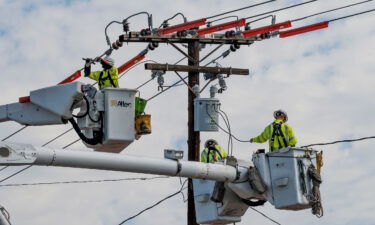 Workers with Southern California Edison replace a transformer in 2021. Crews were doing repairs after lightening storms had moved through the area the previous night.