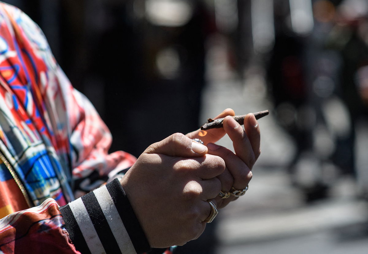 <i>Angela Weiss/AFP/Getty Images</i><br/>Marijuana is held during the annual NYC Cannabis Parade & Rally in support of the legalization of marijuana for recreational and medical use