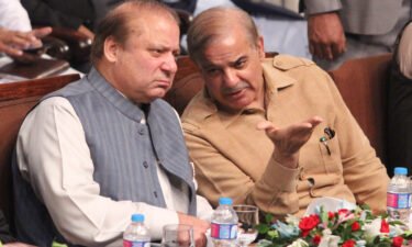 Pakistan's former prime minister Nawaz Sharif (L) with his younger brother Shehbaz Sharif in Lahore
