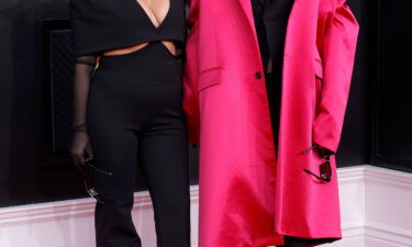 Kourtney Kardashian and Travis Barker pose at the Grammy Awards on April 3. Kardashian shared a series of snapshots of herself and Barker taken at a Las Vegas wedding chapel