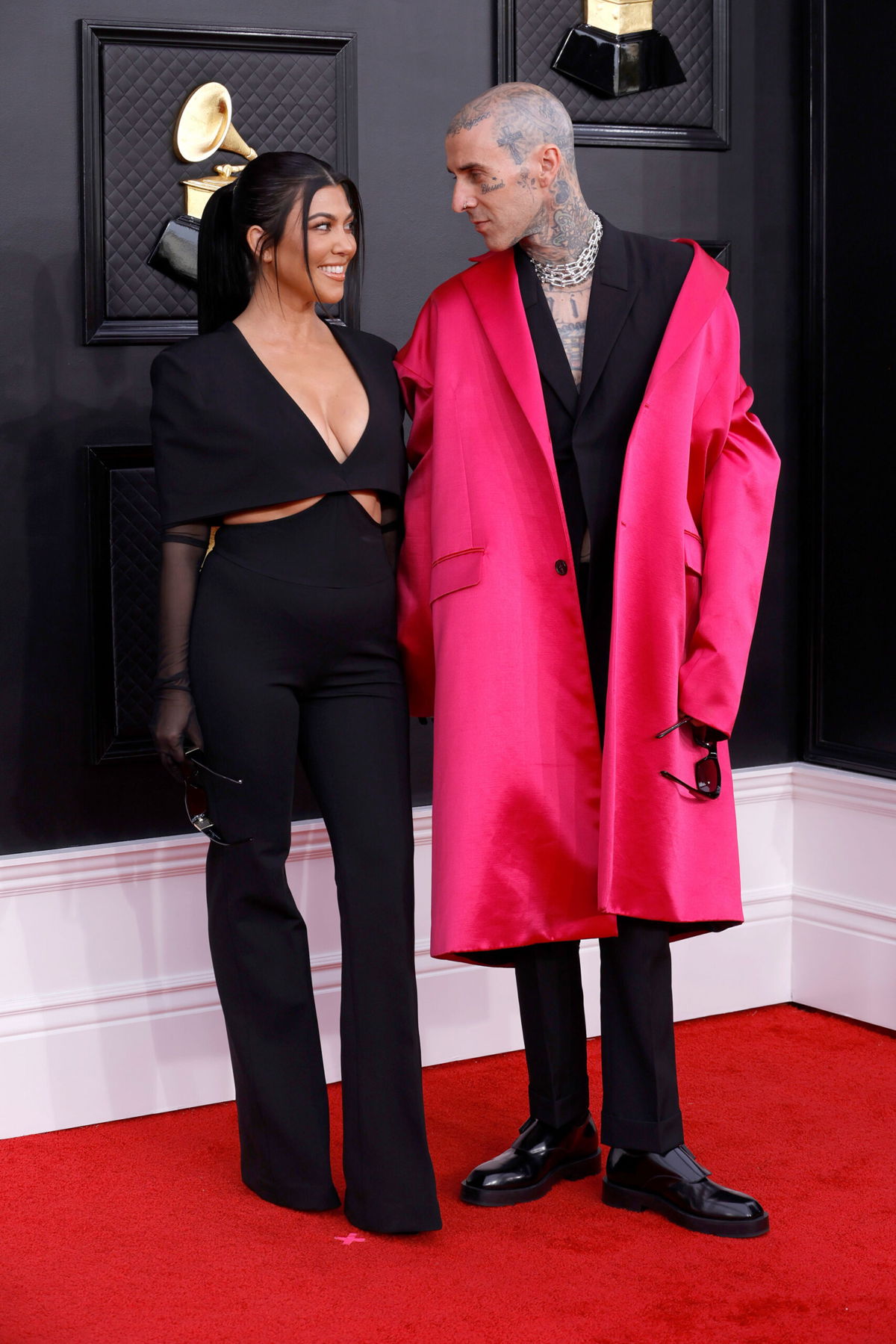 <i>Frazer Harrison/Getty Images for The Recording Academy/File</i><br/>Kourtney Kardashian and Travis Barker pose at the Grammy Awards on April 3. Kardashian shared a series of snapshots of herself and Barker taken at a Las Vegas wedding chapel
