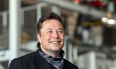 Elon Musk stands in the foundry of the Tesla Gigafactory during a press event. Musk is buying Twitter in a roughly $44 billion deal.