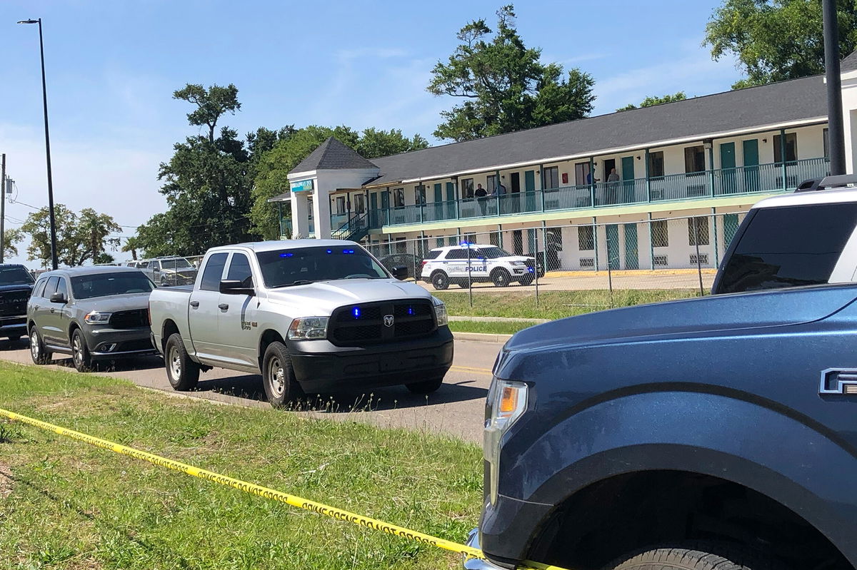 <i>Jasmine Lotts/WLOX-TV/AP</i><br/>A man shot and killed three people at a Broadway Inn Express in Biloxi