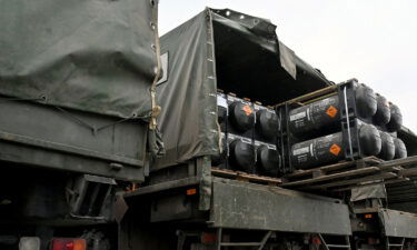 Ukrainian servicemen load a truck with the FGM-148 Javelin