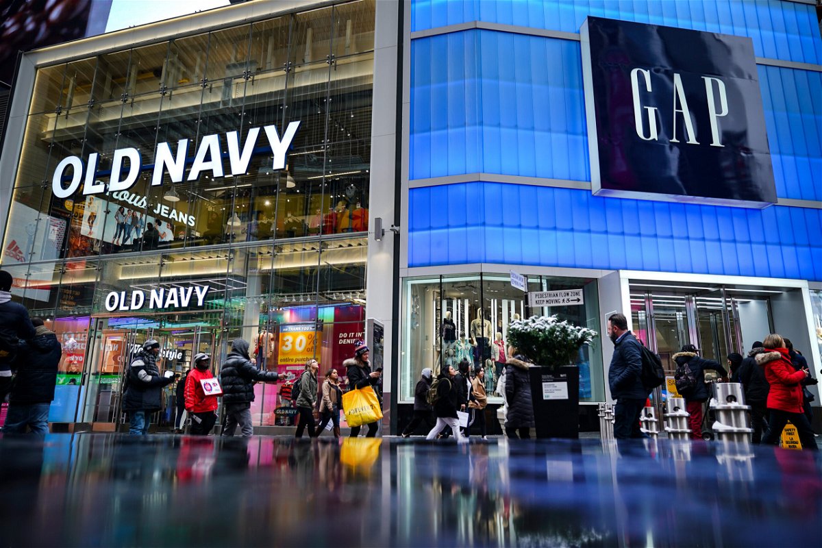 <i>Drew Angerer/Getty Images</i><br/>Pedestrians walk past Old Navy and GAP stores in Times Square