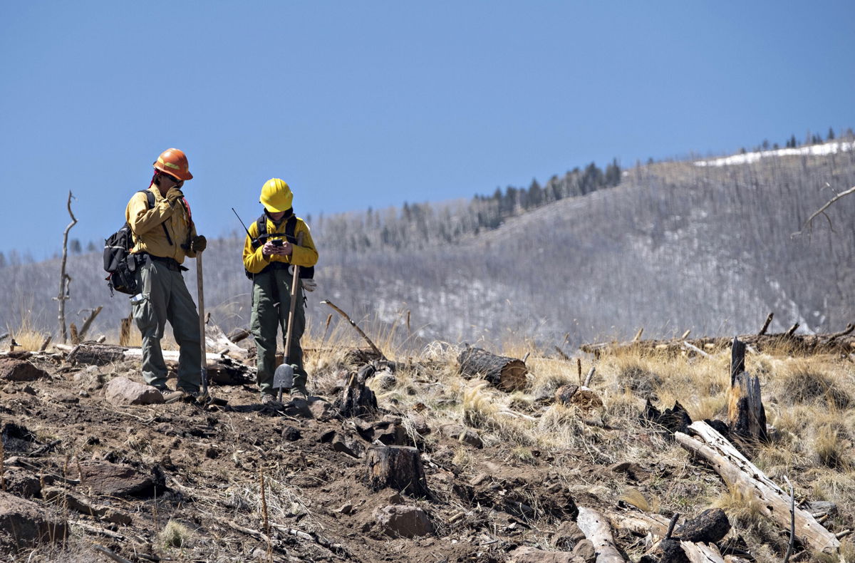 <i>Tom Story/AP</i><br/>Over 4 million in the Southwest face an 'extremely critical' fire danger Friday as strong winds hit the region. Advisors from the Coconino National Forest study the Tunnel Fires impact April 21
