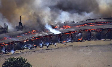 Firefighters respond to a four-alarm blaze near the docks in Benicia