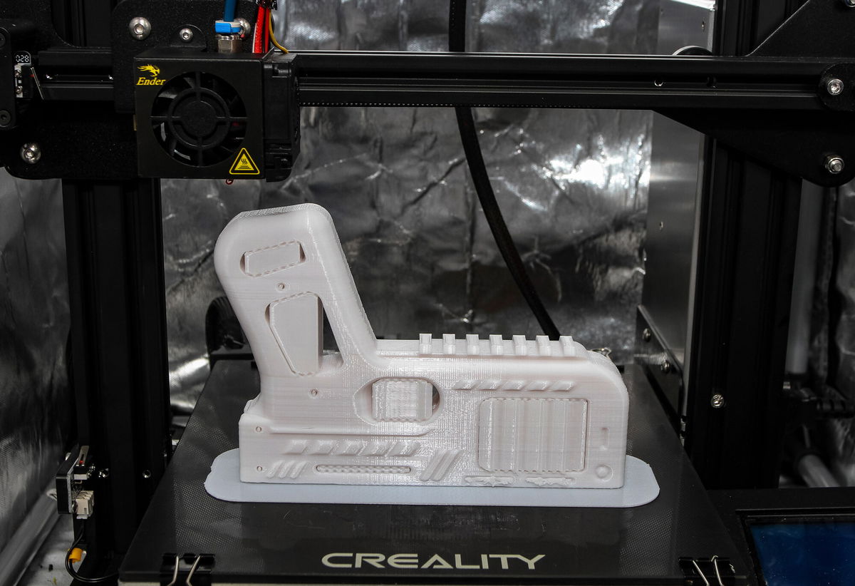 <i>Collin Mayfield/SIPAPRE/Sipa USA/AP</i><br/>A frame for a Maverick-V2 revolver is printed on an Ender 3 printer in Auburn