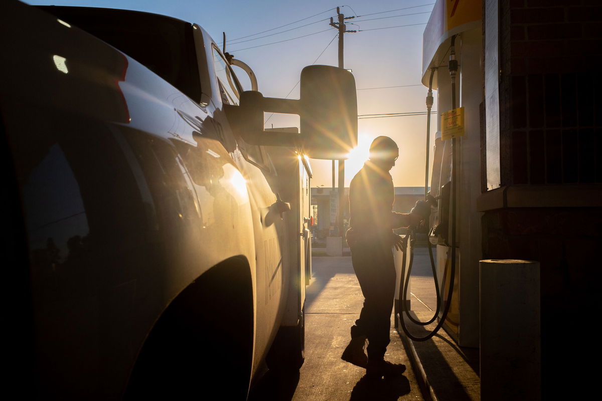 <i>Brandon Bell/Getty Images</i><br/>A person finishes pumping gas at a Shell station on April 1