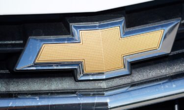 The company logo shines off the grille of 2021 Equinox sports-utility vehicle at a Chevrolet dealership September 12
