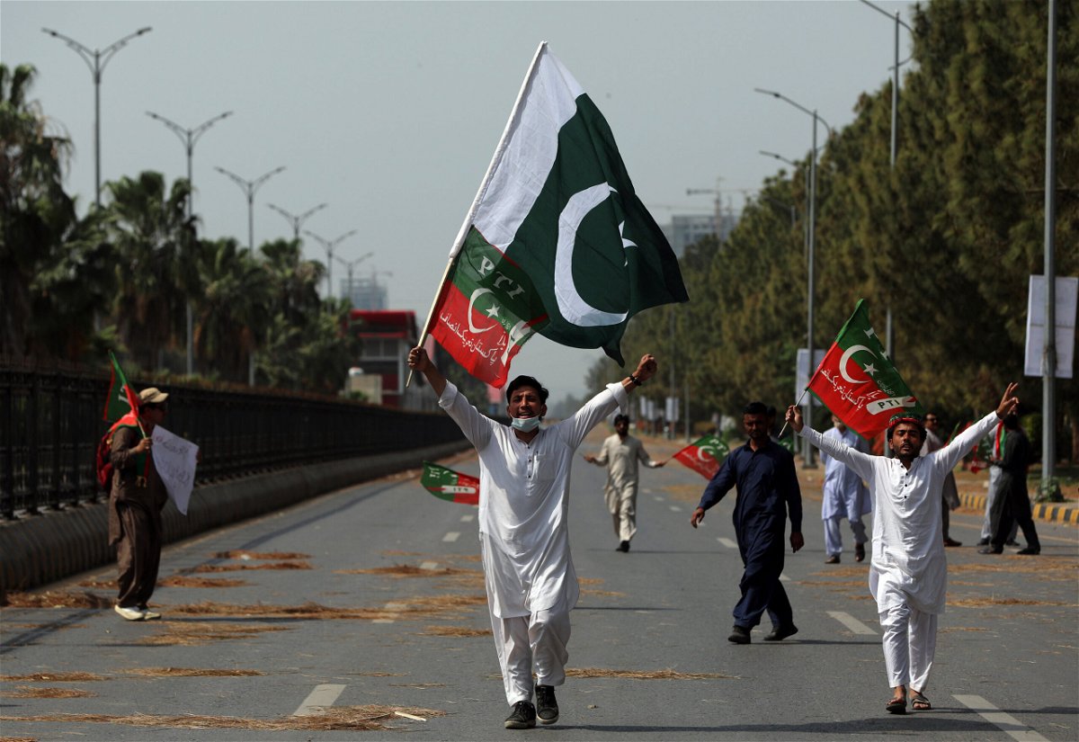 <i>Rahmat Gul/AP</i><br/>Supporters of Prime Minister Imran Khan chant slogans during a protest in Islamabad