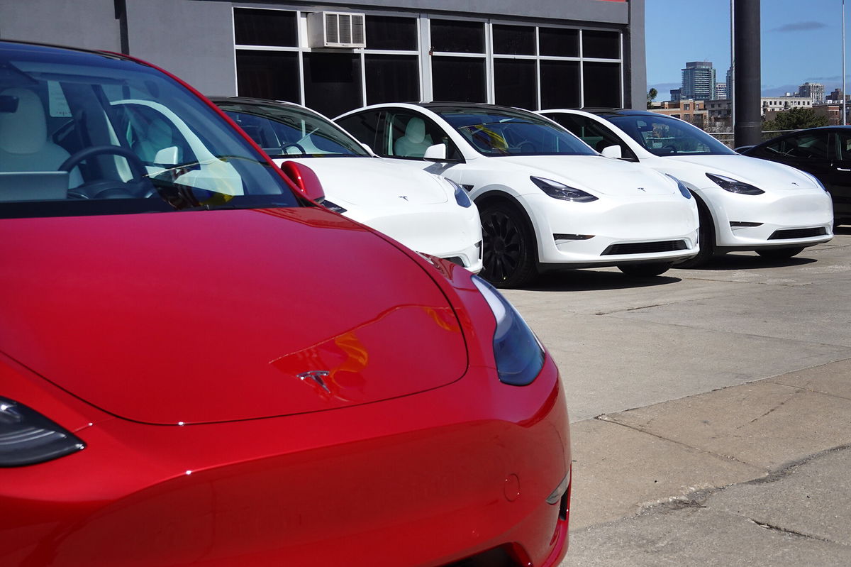 <i>Scott Olson/Getty Images</i><br/>Tesla cars sit in a dealership lot in March 28