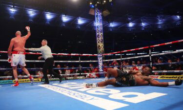 Whyte struggles to get to his feet after Fury landed the final uppercut.