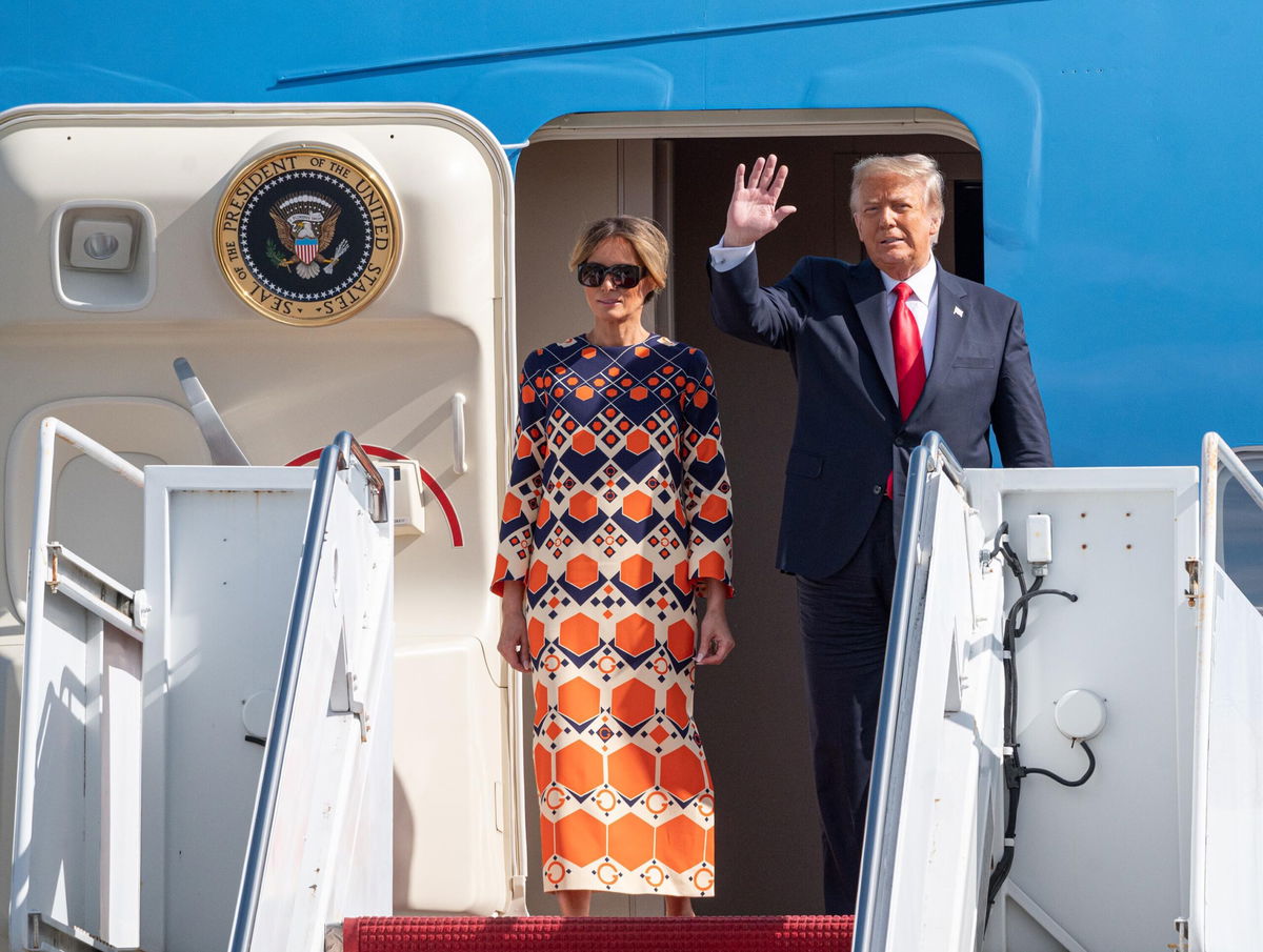 <i>Noam Galai/Getty Images</i><br/>Former President Donald Trump and First Lady Melania Trump exit Air Force One at the Palm Beach International Airport on the way to Mar-a-Lago Club in 2020 in West Palm Beach