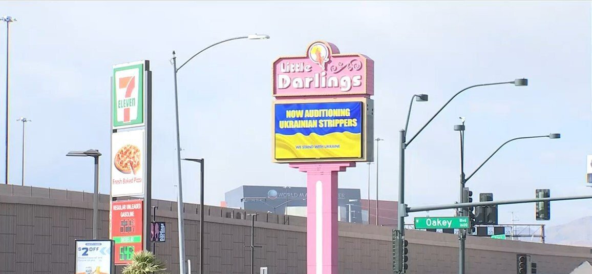 <i>KVVU</i><br/>A sign is turning heads outside Little Darlings Las Vegas strip club and the manager stands behind it.