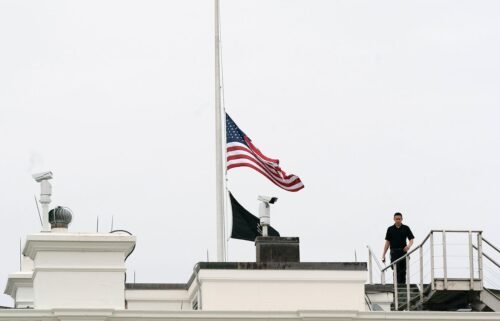 An American flag flies at half-staff at the White House on May 24