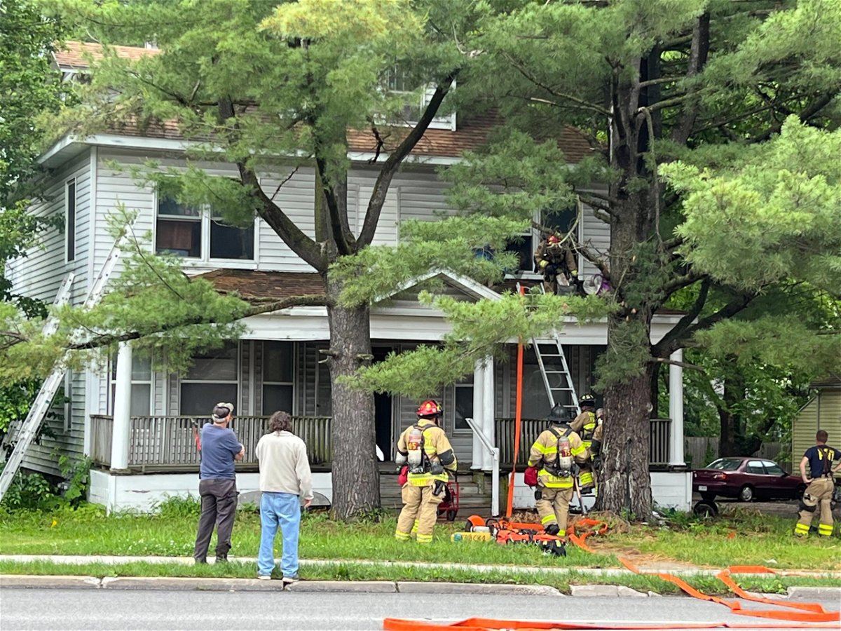 Firefighters work at 408 N. College Ave. in Columbia on Thursday, May 26, 2022.