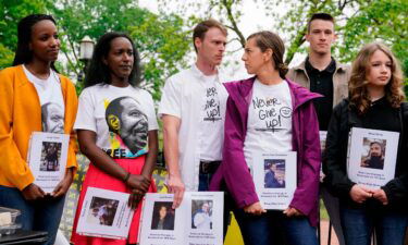 Family members of Americans who are being held hostage or wrongfully detained overseas attend a news conference in Lafayette Park near the White House