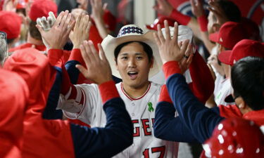 Los Angeles Angels designated hitter Shohei Ohtani in the dugout after hitting a grand slam home run in the seventh inning of an MLB baseball game against the Tampa Bay Rays played on May 9