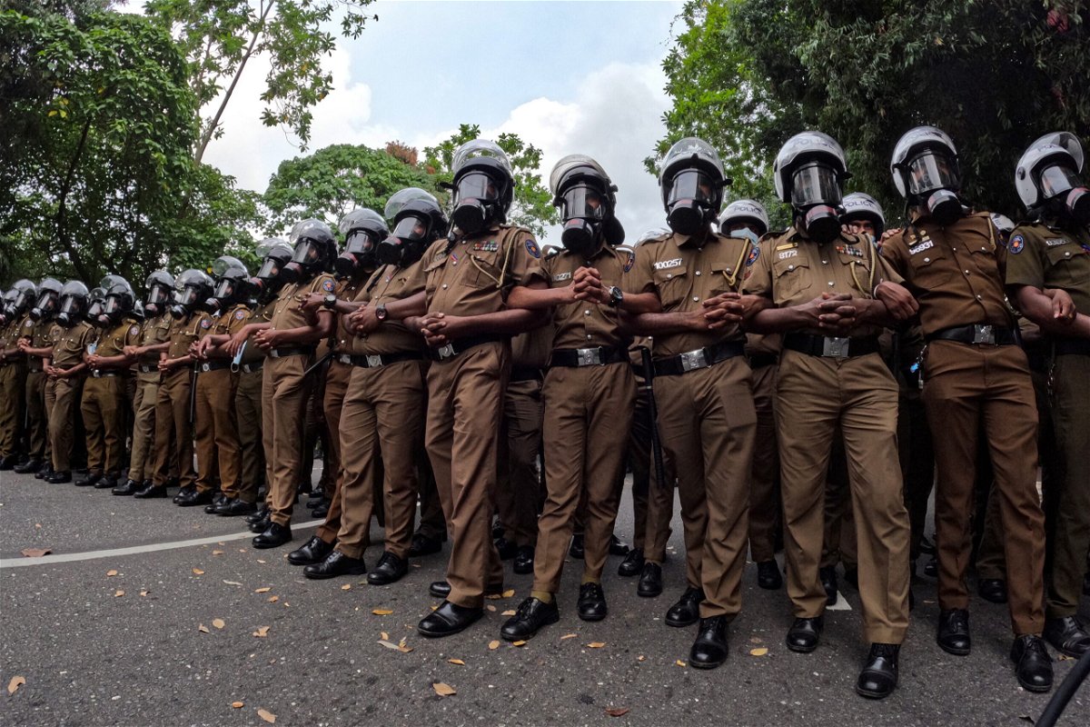 <i>Tharaka Basnayaka/NurPhoto/Getty Images</i><br/>Sri Lankan police officers attend a demonstration near the parliament building in Colombo by protesters demanding President Gotabaya Rajapaksa's resignation on May 4.