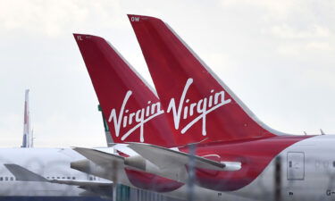 A Virgin Atlantic aircraft left London Heathrow Airport before turning back because the pilot hadn't completed a final flying test.