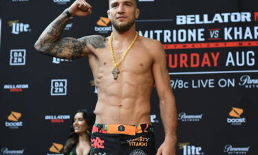 Yaroslav Amosov poses for photos at the weigh-in before challenging Dave Rickels in August 2019.