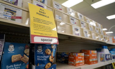 A sign is posted at a CVS pharmacy indicating a shortage in the availability of baby food on May 10