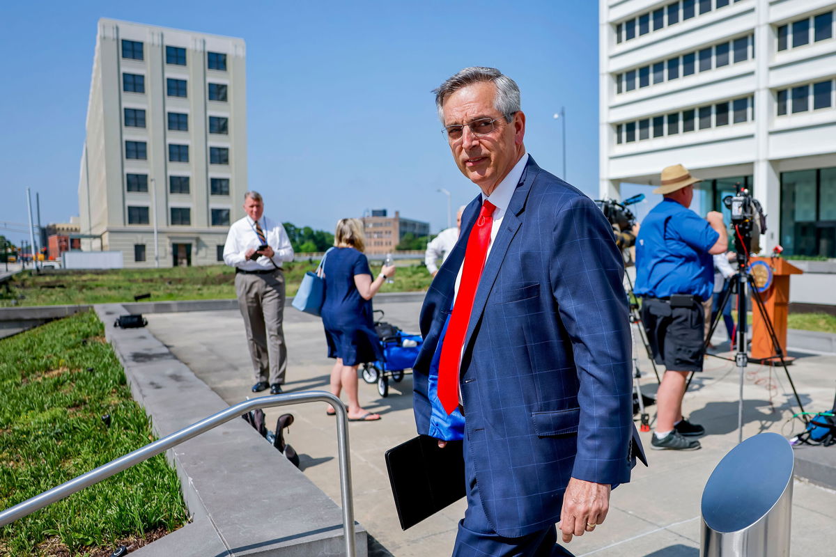 <i>Erik S Lesser/EPA-EFE/Shutterstock</i><br/>Republican Georgia Secretary of State Brad Raffensperger leaves after a news conference outside the Richard B. Russell Federal Building in Atlanta