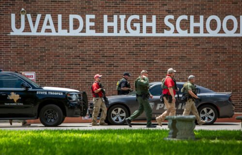 Parents waited late into the night for children to be identified after a gunman killed 19 students and 2 adults at a Texas elementary school.