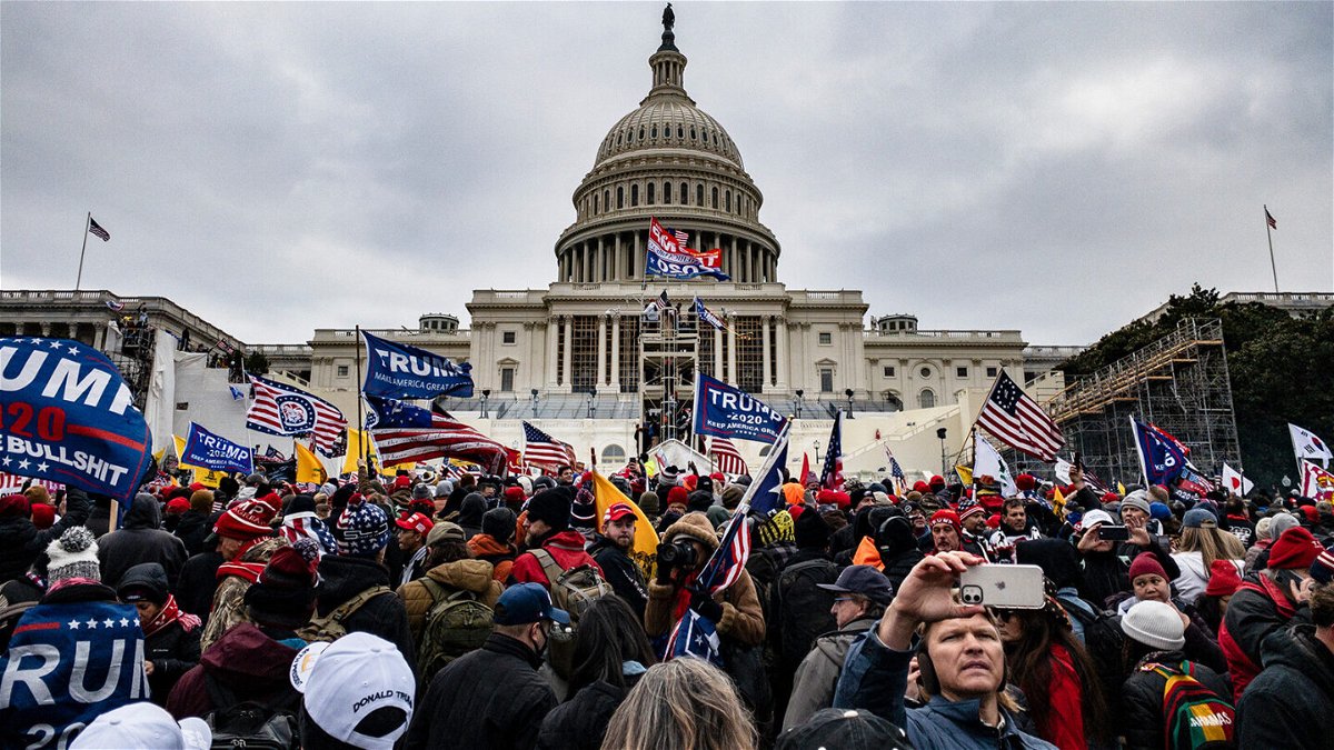 <i>Samuel Corum/Getty Images</i><br/>Supporters storm the US Capitol following a rally with President Donald Trump on January 6