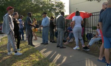 People seen waiting outside the US Immigration and Customs Enforcement office in Orlando