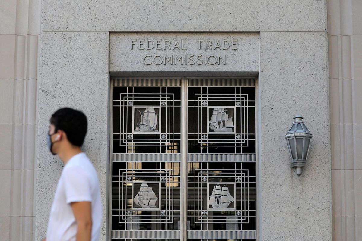 <i>Andrew Kelly/Reuters</i><br/>Signage is seen at the Federal Trade Commission headquarters in Washington. The Senate on May 11 confirmed President Joe Biden's pick for Federal Trade Commissioner