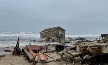 Two beachside homes in North Carolina's Outer Banks collapsed from high water levels and beach erosion on May 10