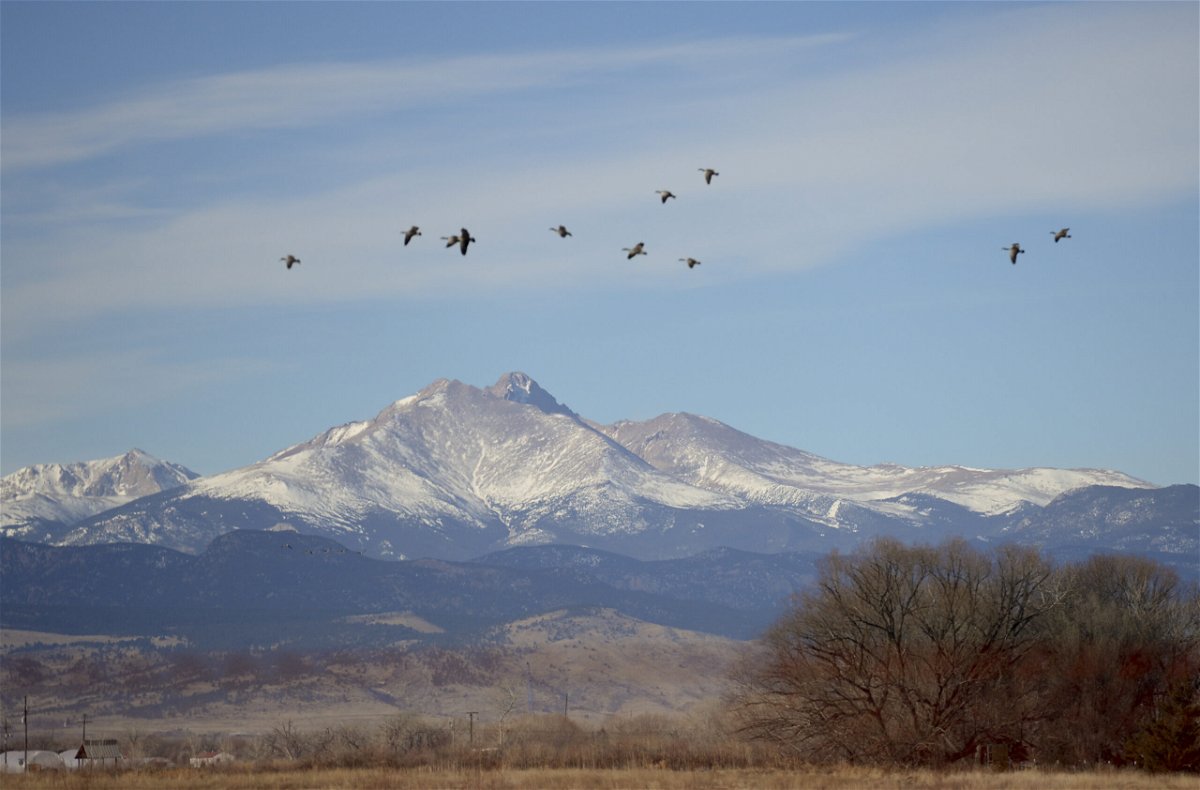 <i>Matt Jonas/Digital First Media/Boulder Daily Camera/Getty Images</i><br/>A climber was missing and two others were injured after a rockfall and avalanche on Mount Meeker in Colorado's Rocky Mountain National Park on Sunday morning. Pictured are Longs Peak and Mount Meeker in this 2016 file photo.