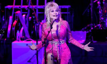 Dolly Parton (pictured here in 2021) gave out souvenir NFTs at this year's SXSW Conference.