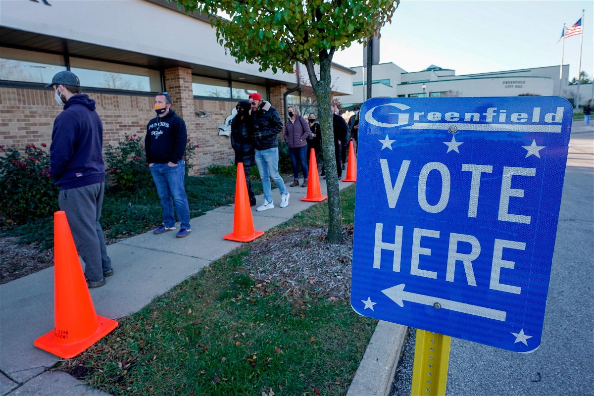 <i>Morry Gash/AP</i><br/>Donald Trump has demanded that a taxpayer-funded probe of the 2020 election in Wisconsin continue past its expiration date. People here line up to vote on Election Day in Greenfield
