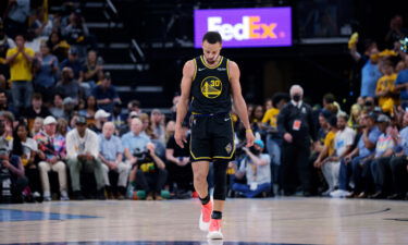 Steph Curry walks back to the bench during the first half of Game 5.