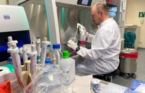 Head of the Institute of Microbiology of the German Armed Forces Roman Woelfel works in his laboratory in Munich on May 20 after Germany detected its first case of monkeypox.