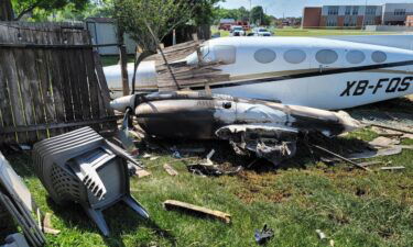 A small plane crashed into a neighbor's backyard in Houston