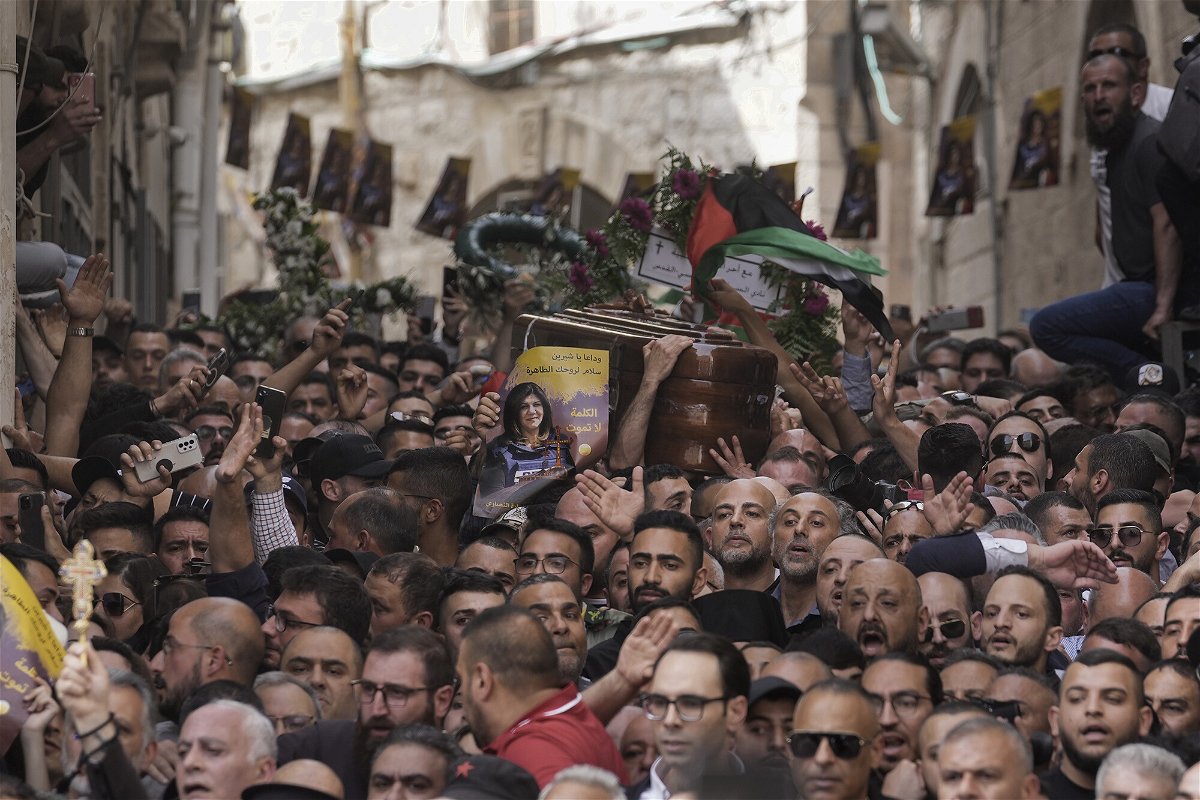 <i>Mahmoud Illean/AP</i><br/>Mourners carried the casket of Shireen Abu Akleh on May 13.