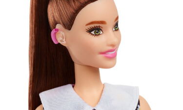 Barbie unveils hearing impaired doll.