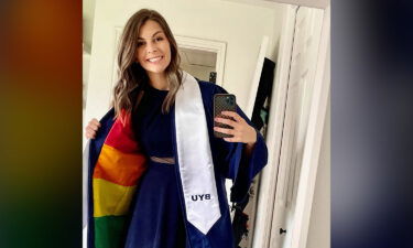 Brigham Young University graduate Jillian Orr sewed a rainbow flag into her gown