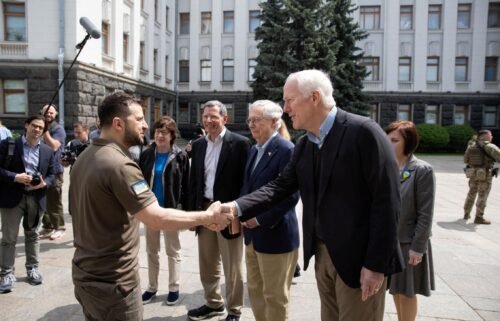 The Senate is expected to vote on May 19 to pass a roughly $40 billion bill to send aid to Ukraine. Ukraine's President Volodymyr Zelenskiy (left) welcomes Senator John Cornyn (R-TX)