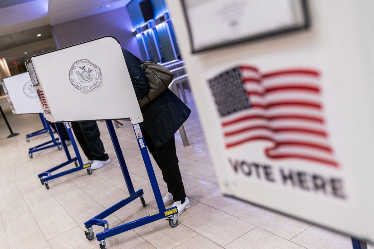 <i>Jeenah Moon/Bloomberg/Getty Images</i><br/>Voters cast ballots at an early voting location in Madison Square Garden in New York City on October 26