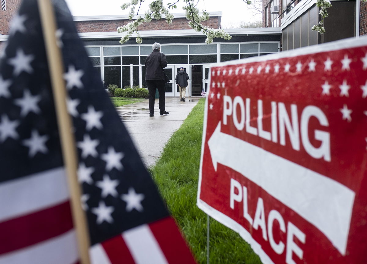 <i>Matthew Hatcher/Bloomberg/Getty Images</i><br/>Voters arrive at a polling station in Toledo